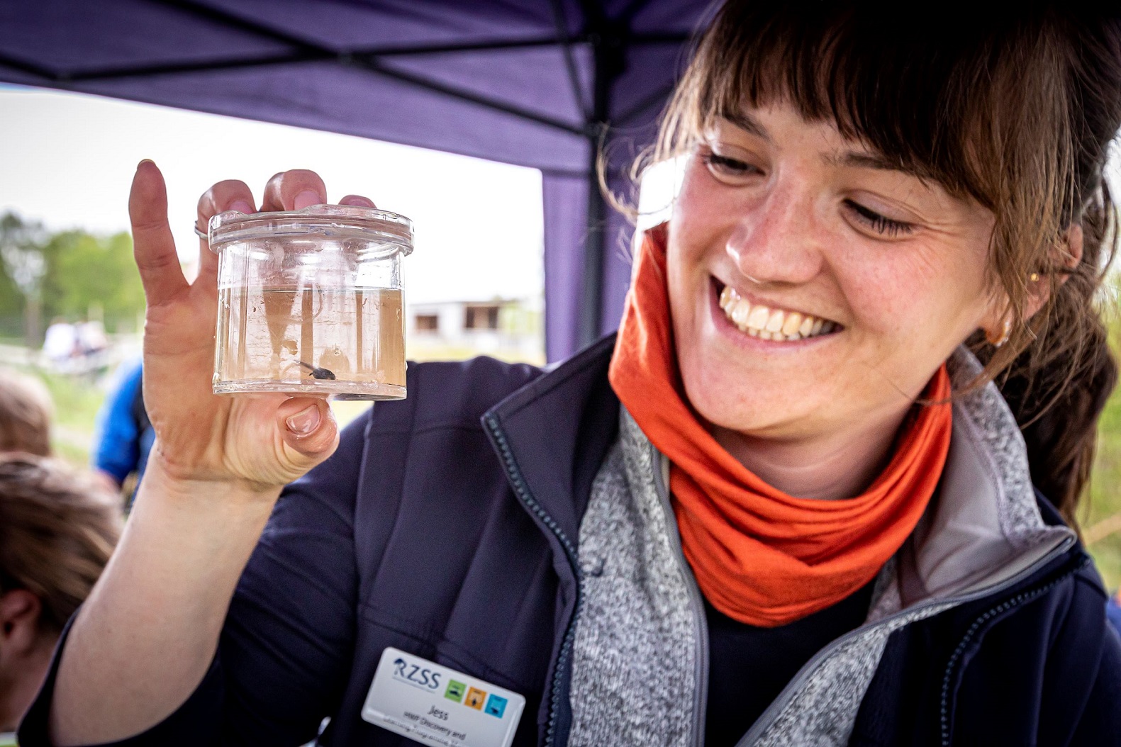 Jess Wise holding pond dipping specimen pot IMAGE: Unknown 2024