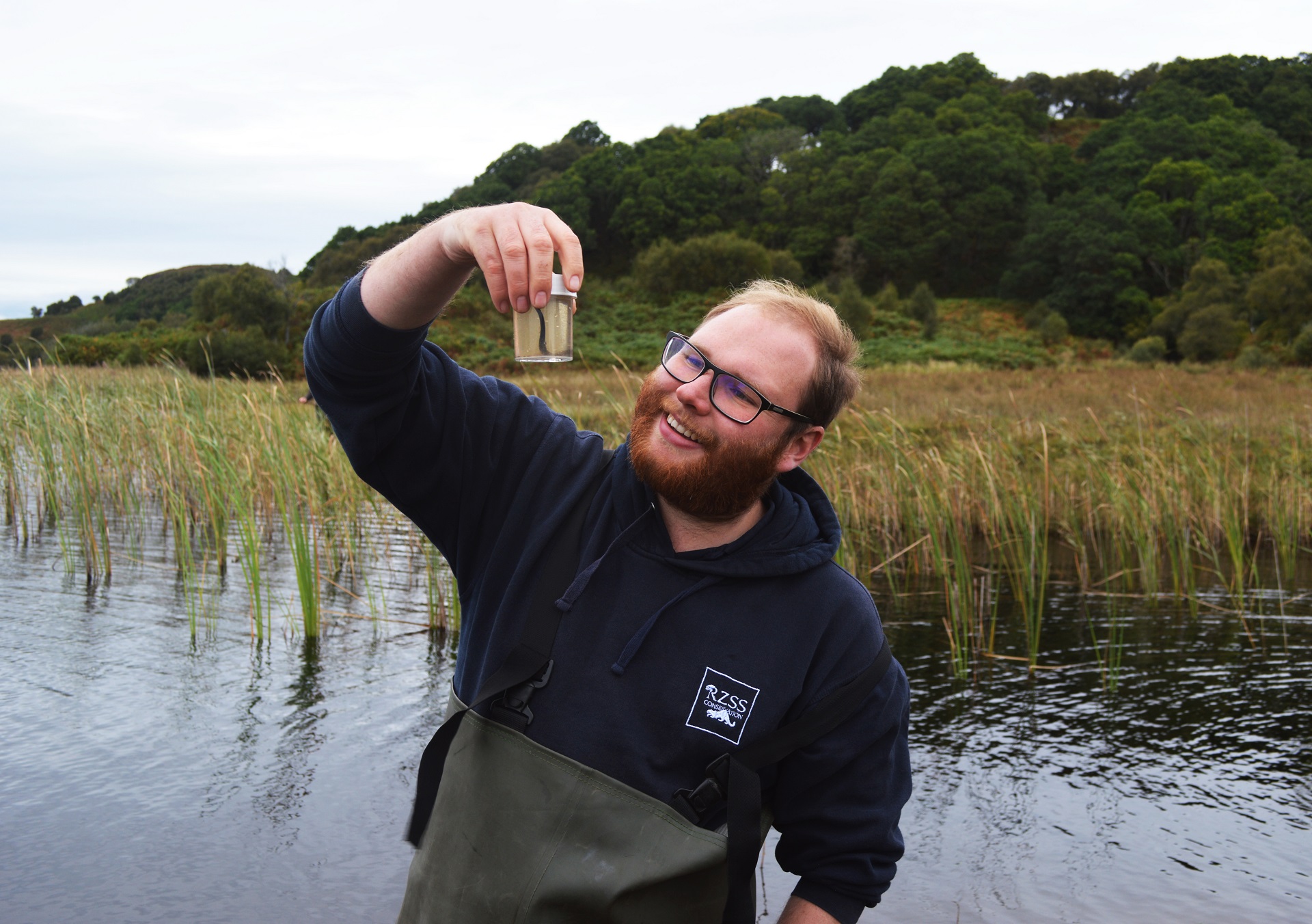 Medicinal leech in jar with keeper Adam Button

IMAGE: RZSS
